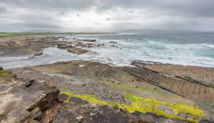 Beach-at-Downpatrick-Head-scaled